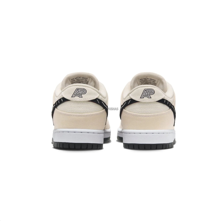 Nike SB Dunk Low Pro Sneakers - Cream & Black with Patterned Swoosh